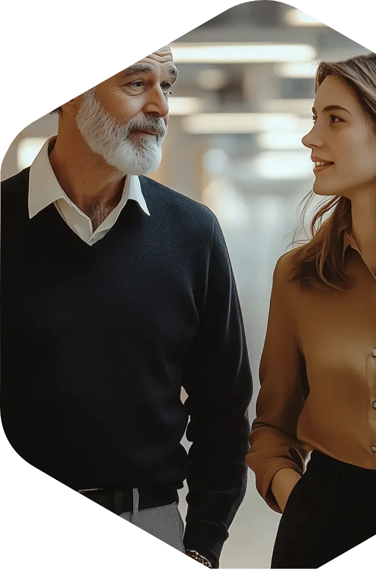 Un père et sa fille, évoquant la transmission de l'entreprise familiale